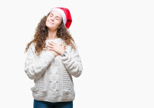 Chica Morena Joven Con Sombrero Navidad Sobre Fondo Aislado Sonriendo — Foto de Stock