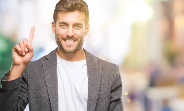 Jonge Knappe Zakenman Geïsoleerde Achtergrond Tonen Omhoog Met Vinger Nummer — Stockfoto