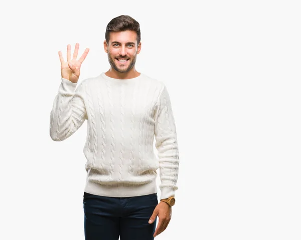 스웨터를 잘생긴 젊은이 보여주는 자신감과 손가락으로 가리키는 — 스톡 사진