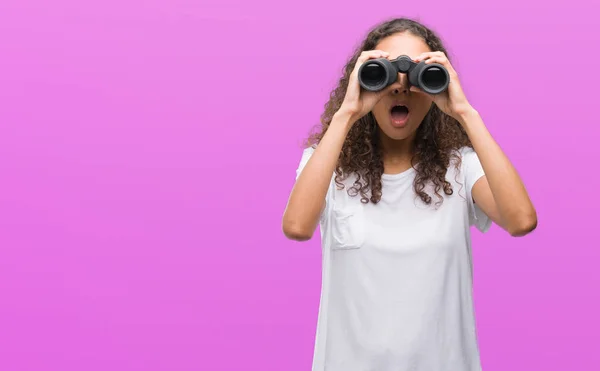 Young Hispanic Woman Looking Binoculars Scared Shock Surprise Face Afraid — Stock Photo, Image