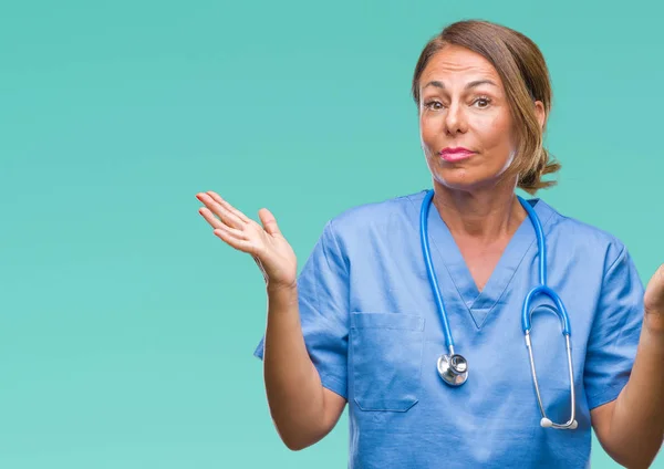 Medelåldern Ledande Sjuksköterska Läkare Kvinna Över Isolerade Bakgrund Aningslös Och — Stockfoto