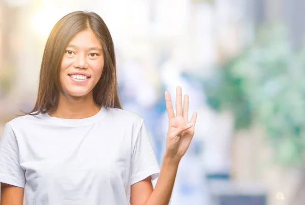 Young Asian Woman Isolated Background Showing Pointing Fingers Number Four — Stock Photo, Image