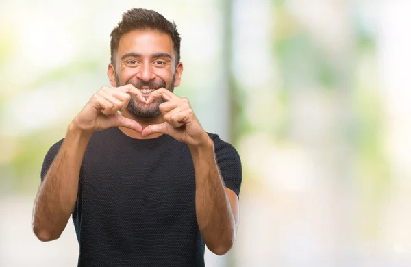 Adult Hispanic Man Isolated Background Smiling Love Showing Heart Symbol — Stock Photo, Image