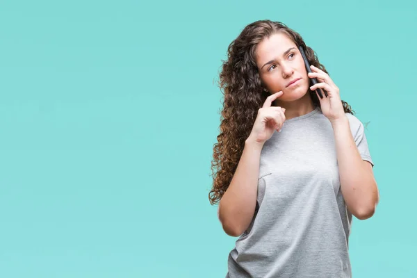 Chica Morena Joven Hablando Teléfono Inteligente Sobre Fondo Aislado Cara — Foto de Stock