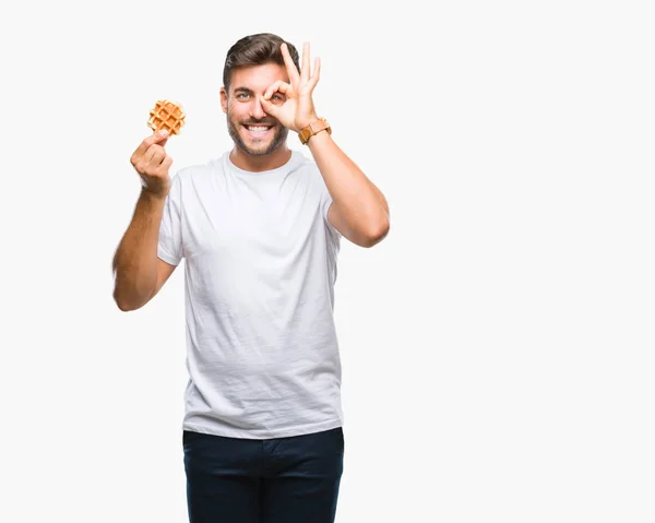 Young Handsome Man Eating Sweet Waffle Isolated Background Happy Face — Stock Photo, Image