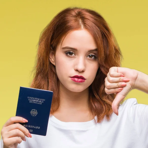 Joven Mujer Hermosa Sosteniendo Pasaporte Alemania Sobre Fondo Aislado Con — Foto de Stock