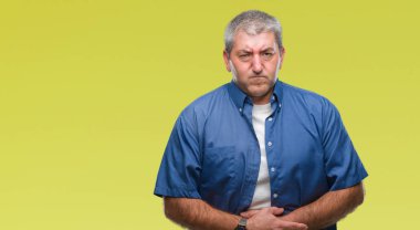 Yakışıklı üst düzey adam izole mide üzerinde el ile arka plan çünkü mide bulantısı, ağrılı hastalık hasta hissediyor. Ağrısı kavramı.