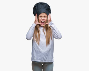 Young beautiful girl wearing chef hat uniform over isolated background celebrating mad and crazy for success with arms raised and closed eyes screaming excited. Winner concept clipart