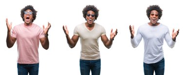 Kolaj bir Afrikalı-Amerikalı genç adam deli ve çığlık kaldırdı ve açık gözleri heyecanlı silah ile başarı için hayran kutluyor izole arka plan üzerinde güneş gözlüğü takıyor. Kazanan kavramı