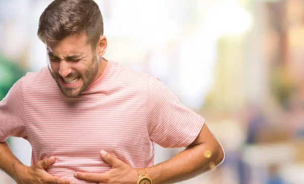 Homem Bonito Jovem Sobre Fundo Isolado Com Mão Estômago Porque — Fotografia de Stock