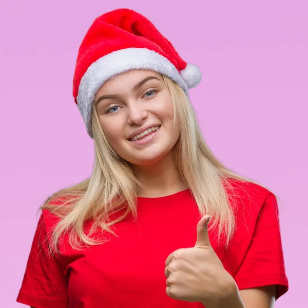 Молодая Белая Женщина Рождественской Шляпе Изолированном Фоне Делает Счастливый Жест — стоковое фото