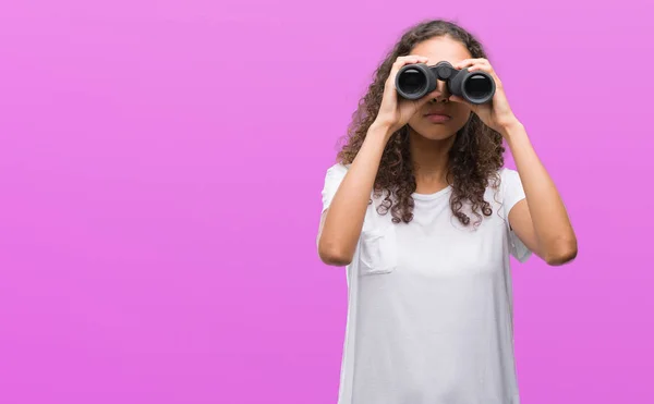 Young Hispanic Woman Looking Binoculars Confident Expression Smart Face Thinking — Stock Photo, Image