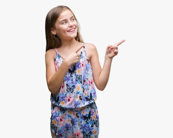 年轻漂亮的女孩穿着五颜六色的衣服 在孤立的背景微笑着 看着相机指着两个手和手指的侧面 — 图库照片