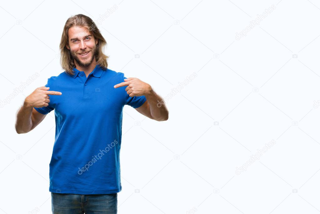 Young handsome man with long hair over isolated background looking confident with smile on face, pointing oneself with fingers proud and happy.