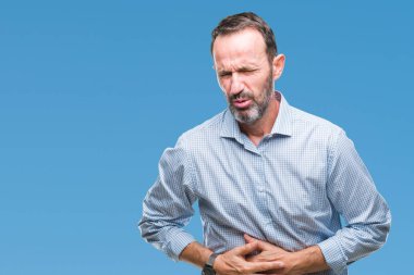 Orta yaş ağarmış üst düzey iş adamı üzerinde izole mide üzerinde el ile arka plan çünkü mide bulantısı, ağrılı hastalık hasta hissediyor. Ağrısı kavramı.