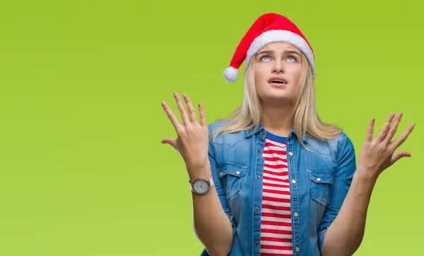 Junge Kaukasische Frau Mit Weihnachtsmütze Über Isoliertem Hintergrund Verrückt Und — Stockfoto