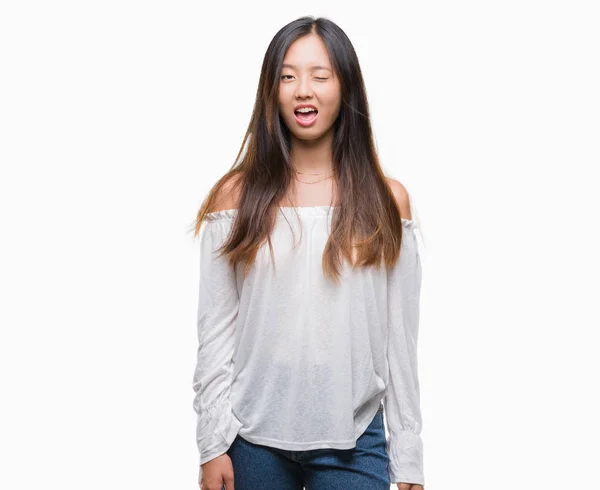Young Asian Woman Isolated Background Winking Looking Camera Sexy Expression — Stock Photo, Image