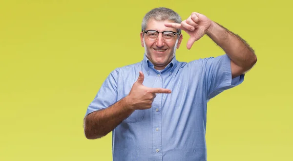 Handsome Senior Man Wearing Glasses Isolated Background Smiling Making Frame — Stock Photo, Image