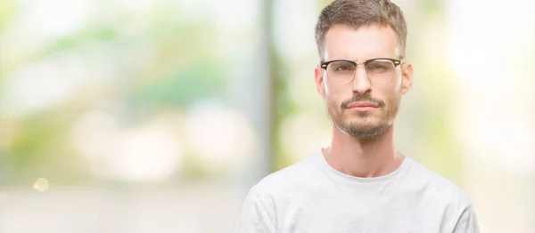 Young Tattooed Adult Man Skeptic Nervous Frowning Upset Because Problem — Stock Photo, Image