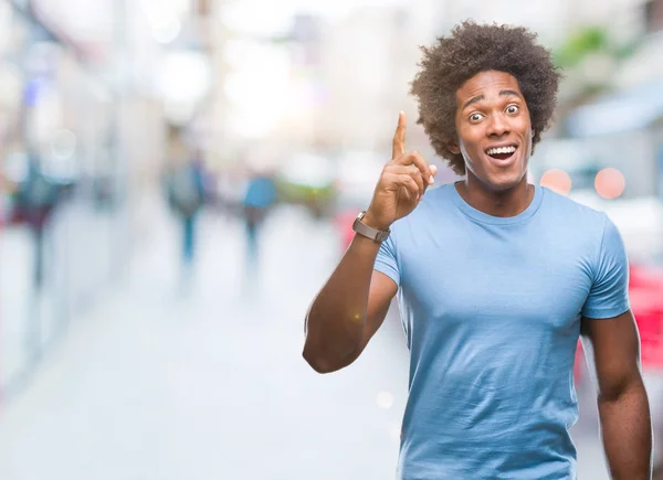 Hombre Afroamericano Sobre Fondo Aislado Apuntando Con Dedo Hacia Arriba —  Fotos de Stock