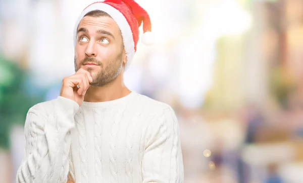 Mladý Pohledný Muž Nosí Santa Claus Klobouk Izolované Pozadí Rukou — Stock fotografie