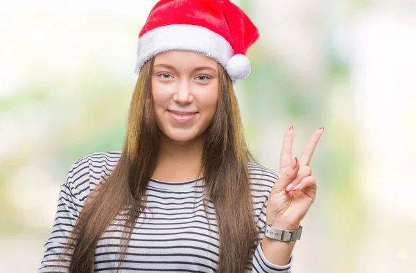 Giovane Bella Donna Caucasica Indossa Cappello Natale Sfondo Isolato Sorridente — Foto Stock