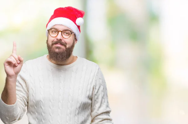 Young Caucasian Man Wearing Christmas Hat Glasses Isolated Background Pointing — Stock Photo, Image