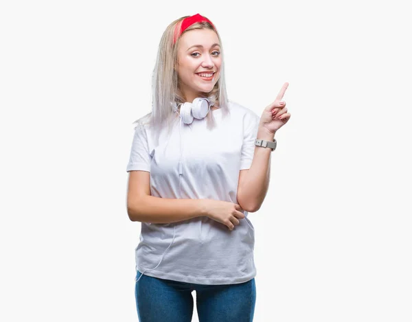 Young Blonde Woman Wearing Headphones Listening Music Isolated Background Big — Stock Photo, Image