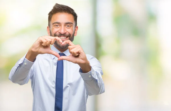 Volwassen Spaanse Zakenman Geïsoleerde Achtergrond Glimlachend Liefde Met Hartsymbool Vorm — Stockfoto