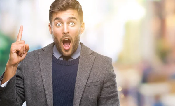 Joven Hombre Negocios Guapo Sobre Fondo Aislado Apuntando Con Dedo — Foto de Stock