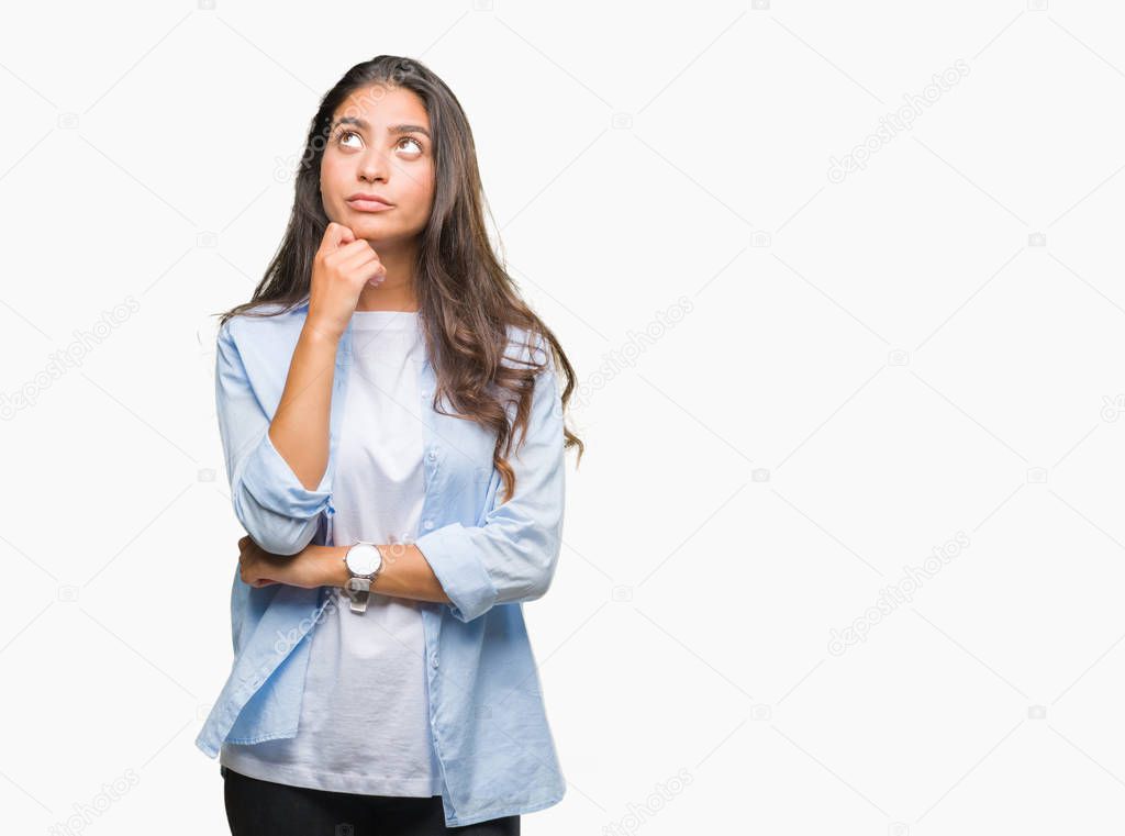 Young beautiful arab woman over isolated background with hand on chin thinking about question, pensive expression. Smiling with thoughtful face. Doubt concept.
