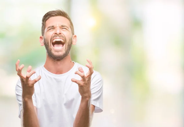 Junger Gutaussehender Mann Mit Isoliertem Hintergrund Verrückt Und Verrückt Schreiend — Stockfoto