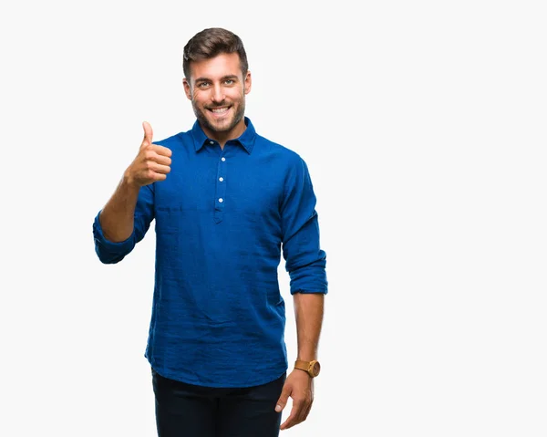 Joven Hombre Guapo Sobre Fondo Aislado Haciendo Pulgares Felices Gesto —  Fotos de Stock