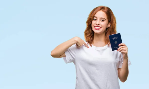 Młoda Kobieta Piękne Paszportem Niemcy Białym Tle Niespodzianka Twarzy Palcem — Zdjęcie stockowe