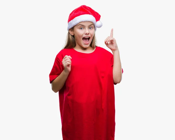 Όμορφη Κοπέλα Φορώντας Καπέλο Χριστουγέννων Πάνω Από Απομονωμένες Φόντο Δείχνει — Φωτογραφία Αρχείου