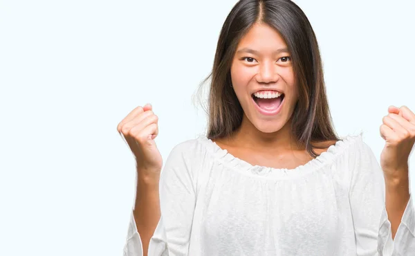 Young Asian Woman Isolated Background Celebrating Surprised Amazed Success Arms — Stock Photo, Image