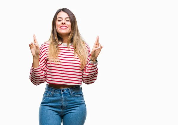 Junge Schöne Frau Lässig Gestreift Winterpullover Über Isoliertem Hintergrund Lächelnd — Stockfoto