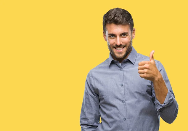 Joven Hombre Guapo Sobre Fondo Aislado Haciendo Pulgares Felices Gesto —  Fotos de Stock