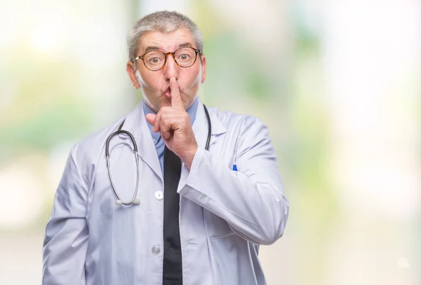 Handsome Senior Doctor Man Isolated Background Asking Quiet Finger Lips — Stock Photo, Image