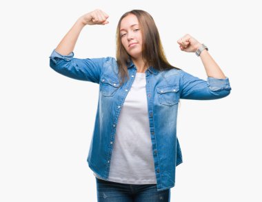 Kol kasları gösterilen izole arka plan üzerinde beyaz genç güzel kadın 