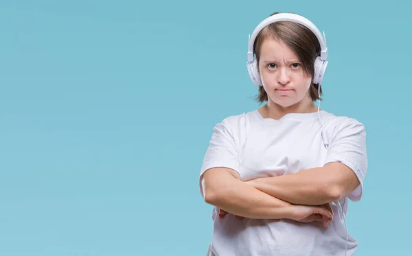 Junge Erwachsene Frau Mit Syndrom Kopfhörer Über Isoliertem Hintergrund Skeptisch — Stockfoto