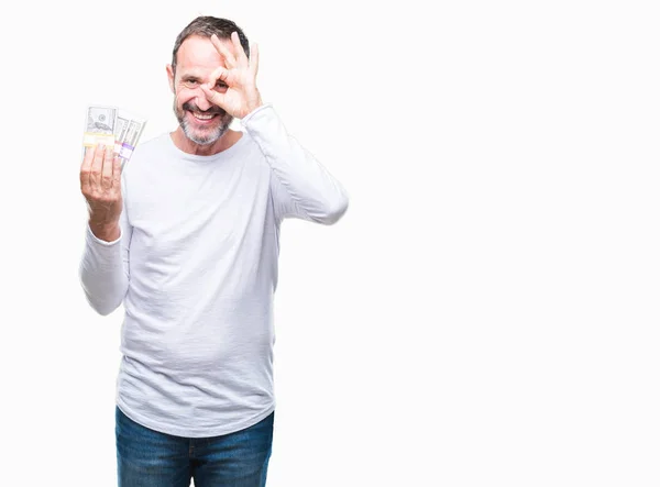 Senior Hombre Canoso Que Sostiene Buch Dólares Sobre Fondo Aislado —  Fotos de Stock