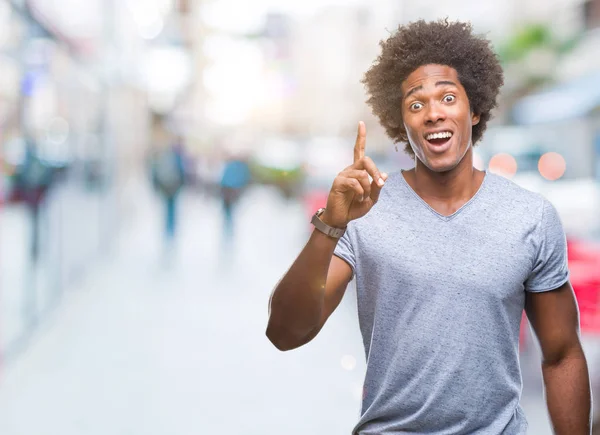 Hombre Afroamericano Sobre Fondo Aislado Apuntando Con Dedo Hacia Arriba —  Fotos de Stock