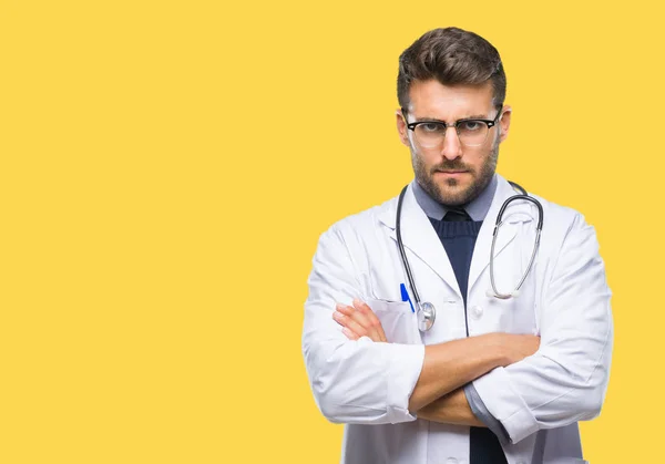 Joven Médico Guapo Sobre Fondo Aislado Escéptico Nervioso Desaprobando Expresión —  Fotos de Stock