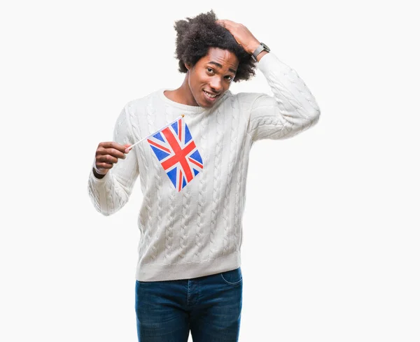 美国黑人男子国旗的英国在孤立的背景下强调与手在头上 震惊与羞愧和惊讶的脸 愤怒和沮丧 对错误的恐惧和不安 — 图库照片