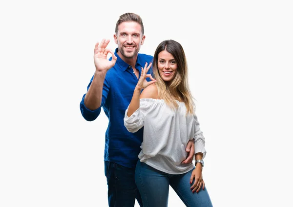 Genç Çift Izole Arka Plan Parmaklar Işaretiyle Yapıyor Olumlu Gülümseyen — Stok fotoğraf