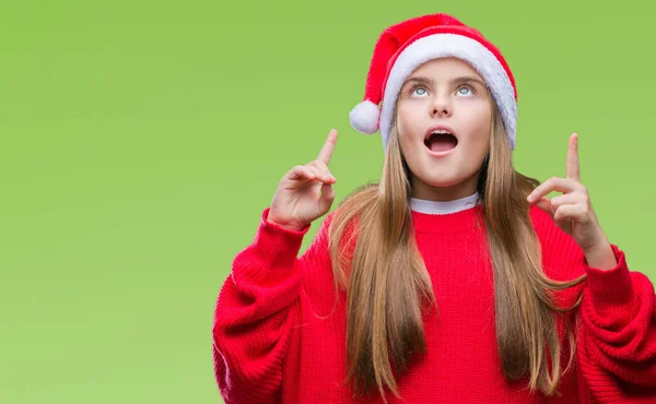 Joven Hermosa Chica Con Sombrero Navidad Sobre Fondo Aislado Sorprendido — Foto de Stock