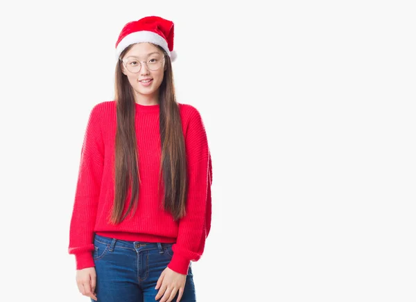 Νεαρή Κινέζα Πέρα Από Απομονωμένο Υπόβαθρο Φοράει Καπέλο Χριστουγέννων Ένα — Φωτογραφία Αρχείου