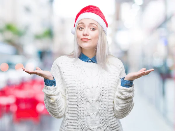 Junge Blonde Frau Mit Weihnachtsmütze Über Isoliertem Hintergrund Ahnungslos Und — Stockfoto