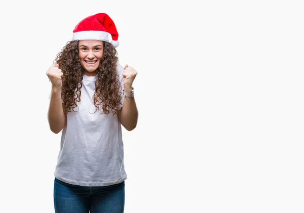 Junge Brünette Mädchen Mit Weihnachtsmütze Über Isoliertem Hintergrund Feiert Überrascht — Stockfoto